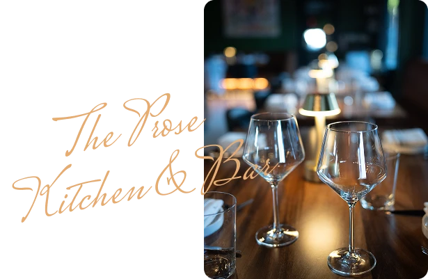 The Prose Kitchen & Bar script logo over wine glasses on a table