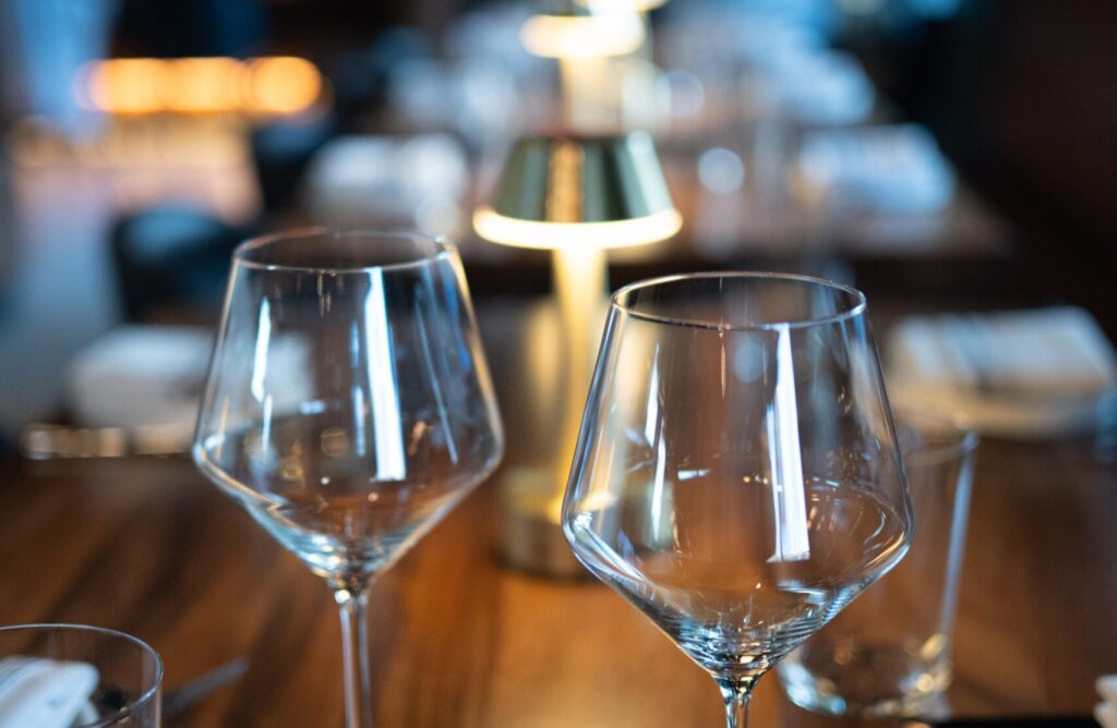 Wine glasses on the bar at Prose Kitchen & Bar